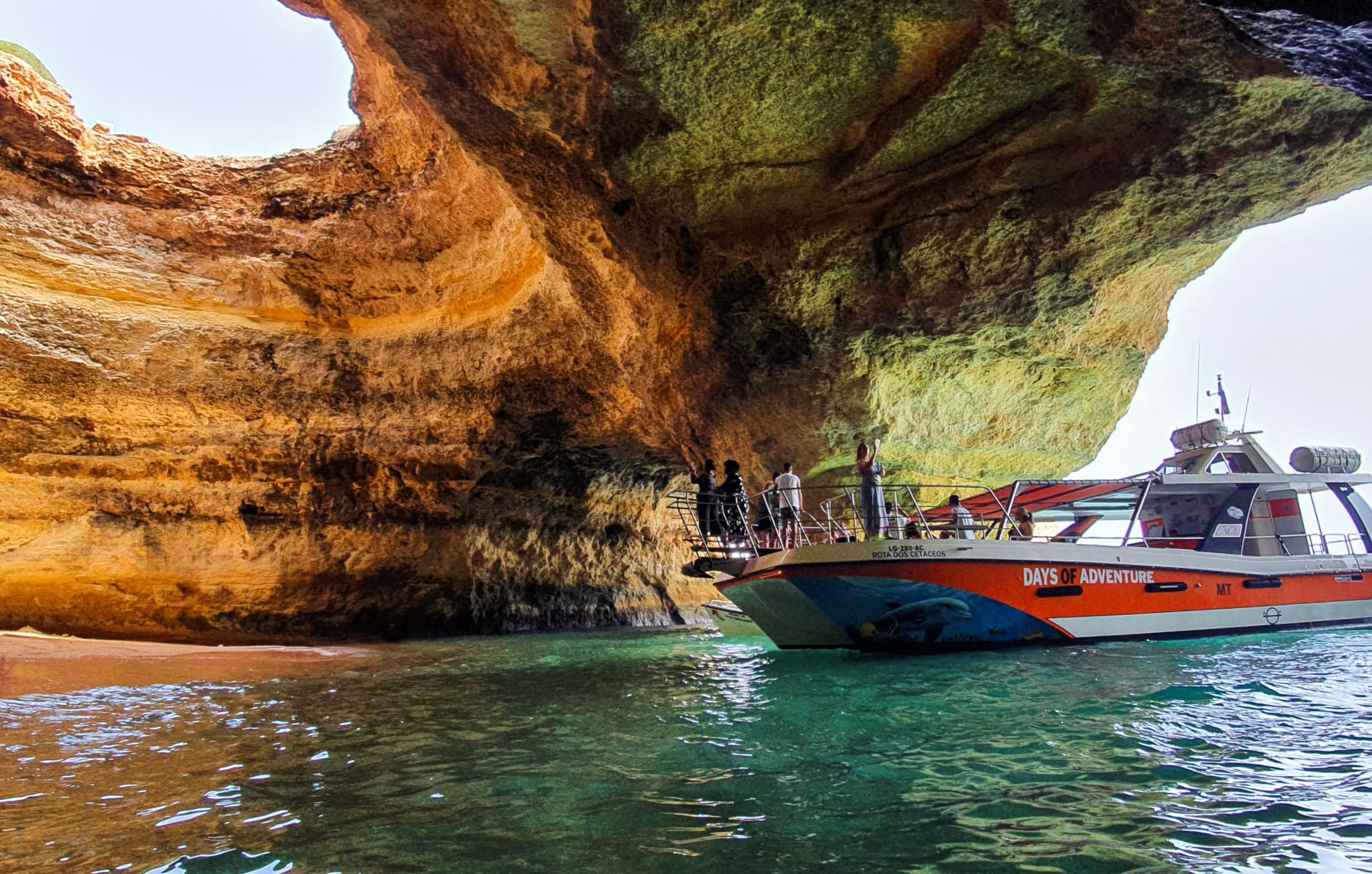 Benagil caves viewed from a catamaran cruise in Algarve