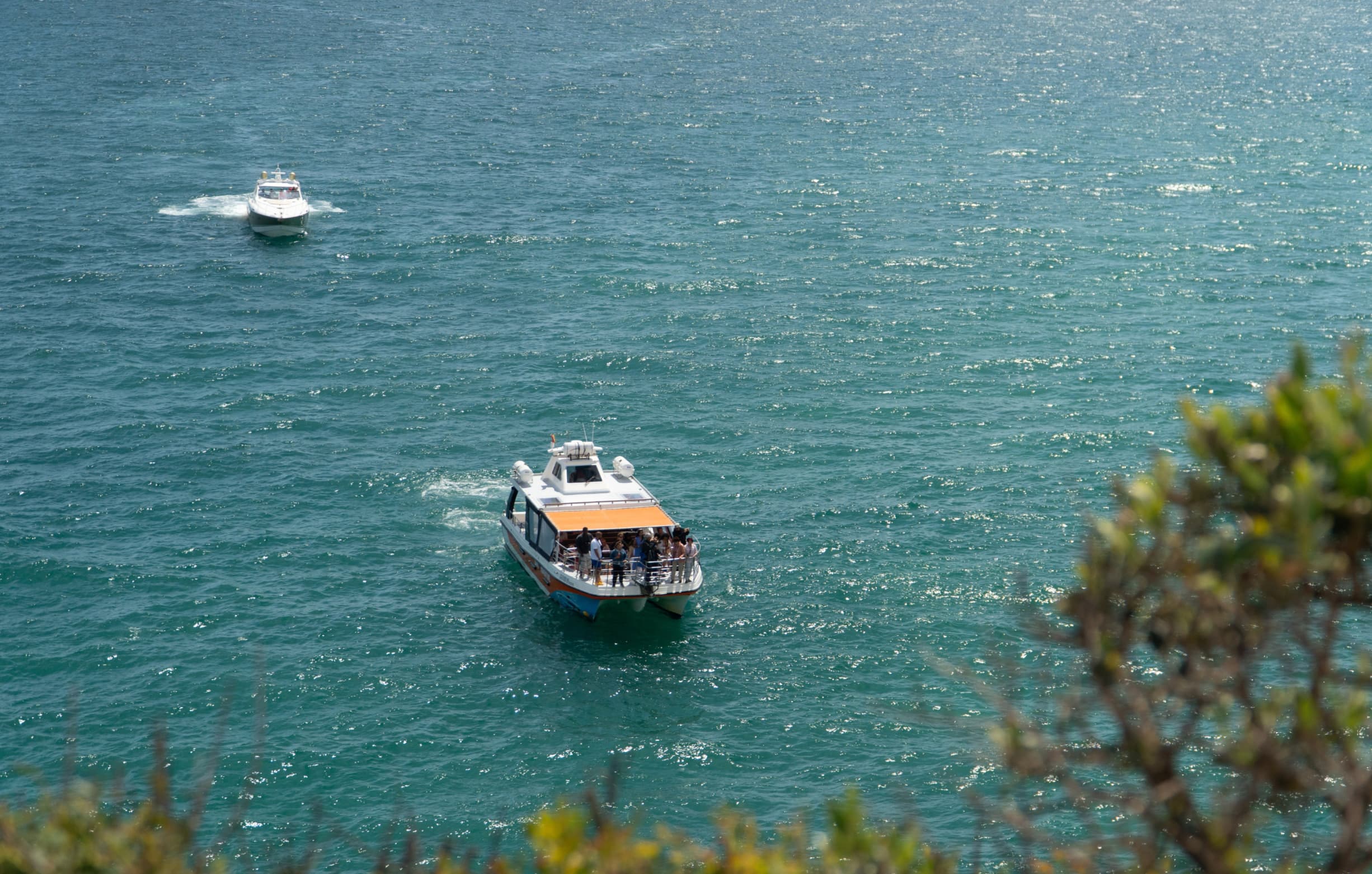 Catamaran sailing near the famous Benagil cave