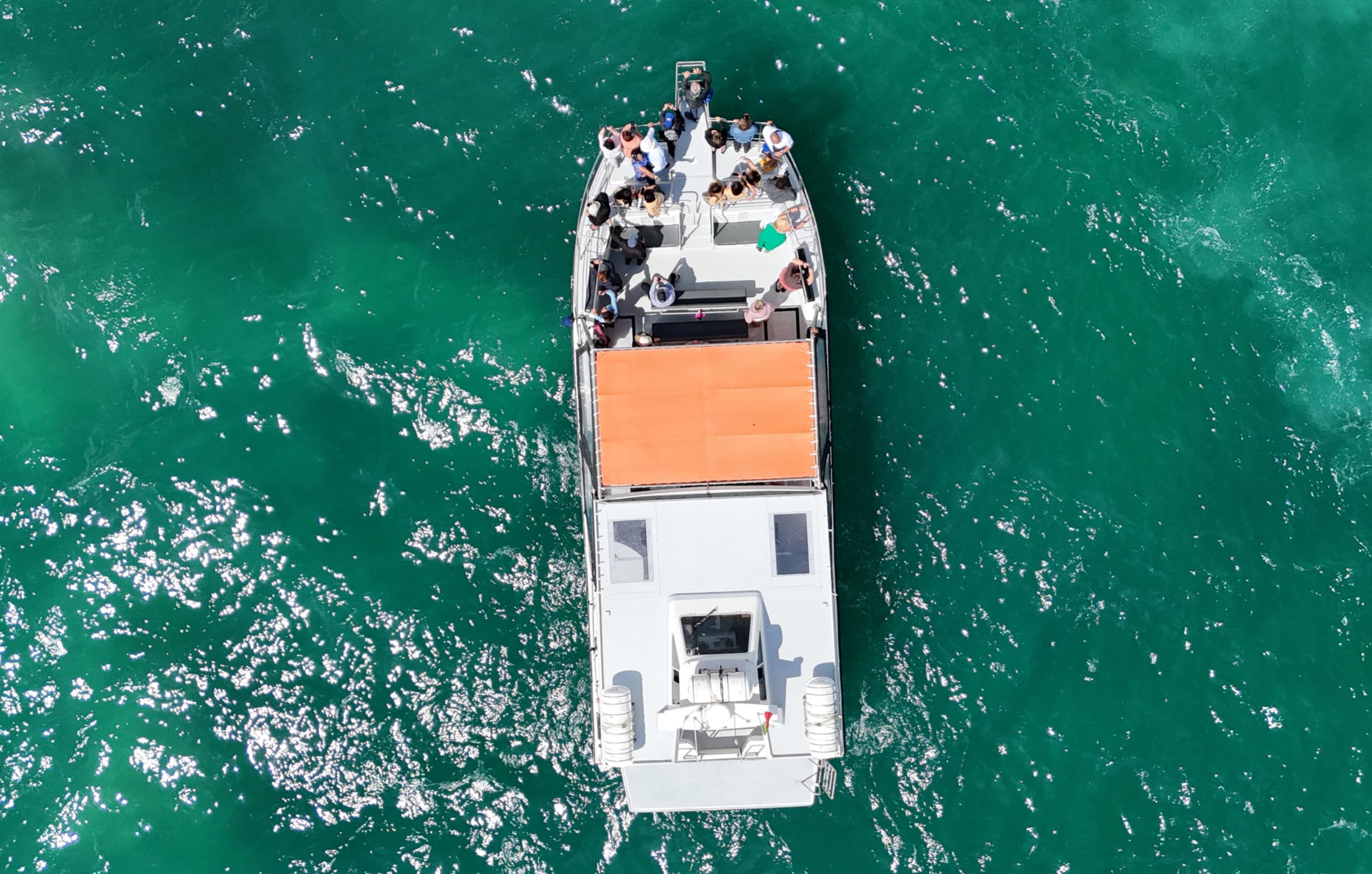 Catamaran cruise approaching the Benagil caves in Algarve