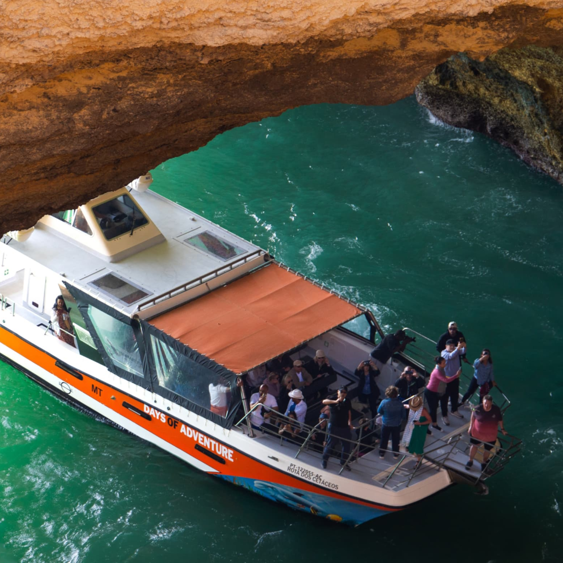Catamaran exploring Benagil caves