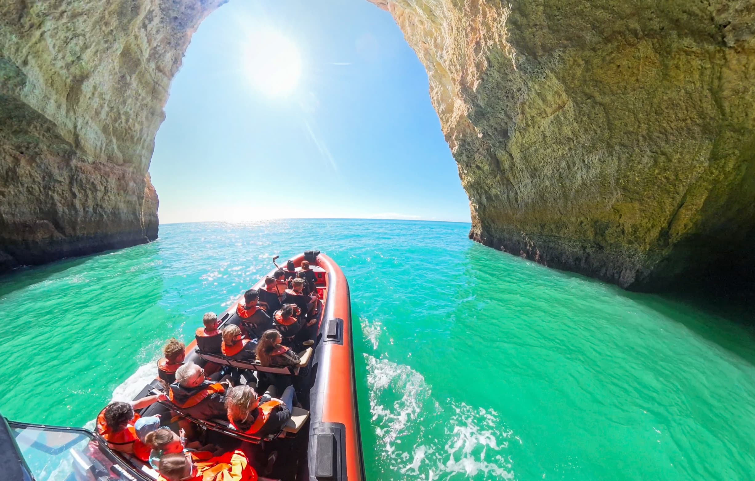 Adventure boat tour through the caves and arches of Benagil