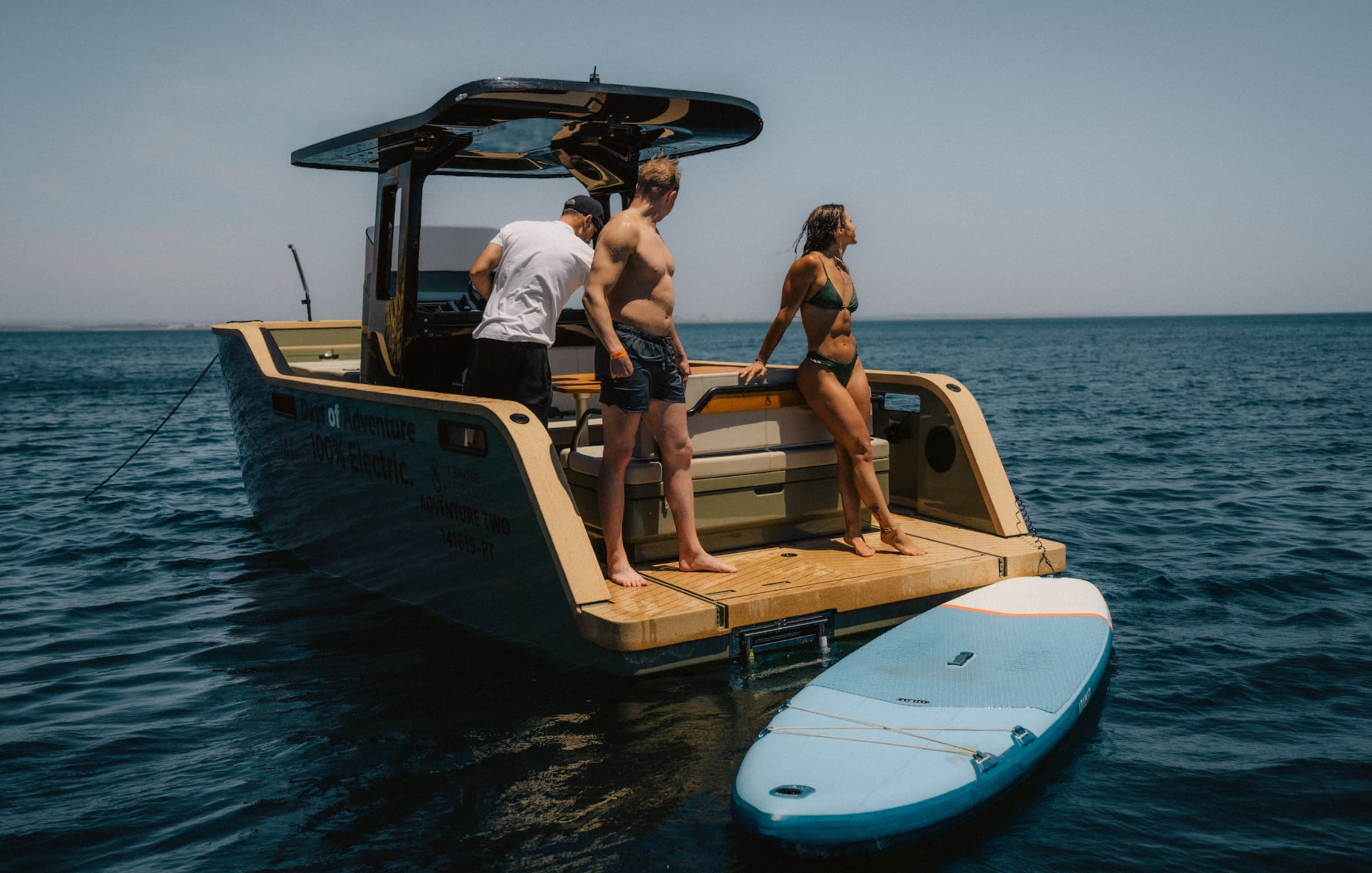 Couple enjoying a private electric boat tour in Lagos